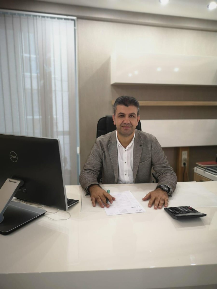Erdem Uğur, Certified Public Accountant, at his desk in Antalya